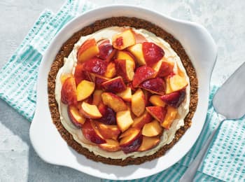 /content/dam/empire/safeway/assets/images/uploads/2023/05/fresh-peach-pie-with-cream-peaches.jpg