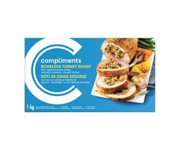 Blue Compliments package of boneless turkey roast with traditional cranberry stuffing with roast pictured on the front.