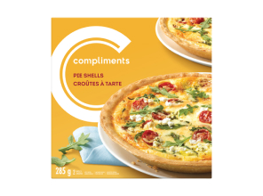 Yellow Compliments pie shell package with a photo on the front.