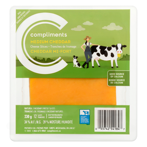 A package shot of Compliments Medium Cheddar Cheese Slices with a green label and an illustration of a cow and a farmer.