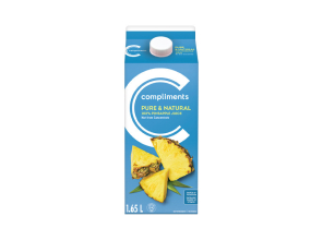 Compliments pineapple juice in a blue milk carton