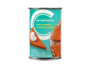 Light blue wrapped tin can of Compliments pure pumpkin puree.