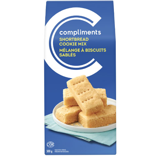 Blue box of Compliments Shortbread Cookie Mix with a stack of shortbread fingers on front of package.